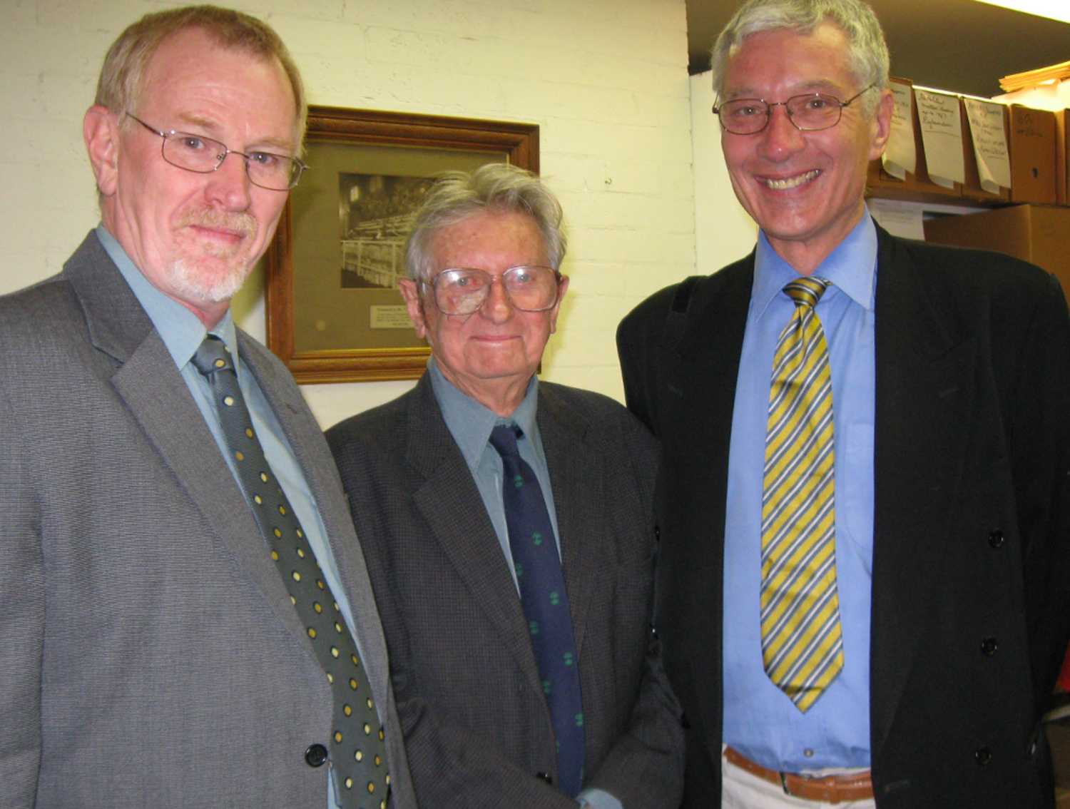 Alan Ventress, Director State Records (Far Left) chats with Lionel Gilbert former Archives Authority member (Center) and Jack Bedson, Acting University Librarian UNE (Far Right), during a visit to the University of New England and Regional Archives in 2008