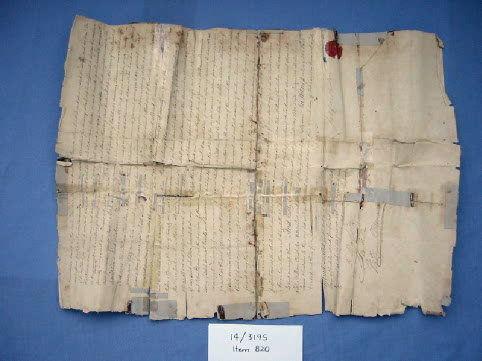 Torn document being prepared for treatment