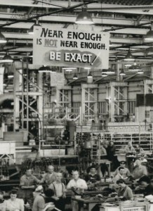 603-57 crop 'Near enough is not near enough. Be exact!' detail from NRS 17420 item 603/57 Aircraft factory, Chullora, c.1943.